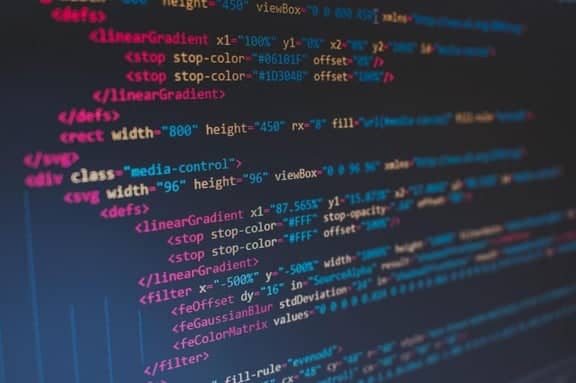 Close up of a computer display with computer code